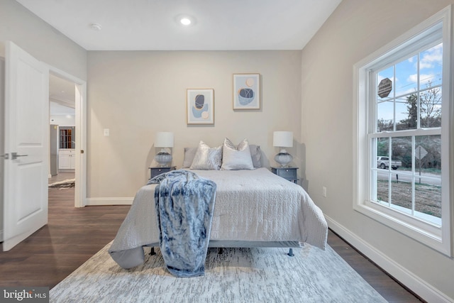 bedroom featuring dark hardwood / wood-style floors