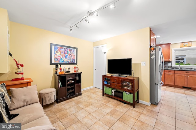 living area featuring light tile patterned floors, baseboards, recessed lighting, and visible vents