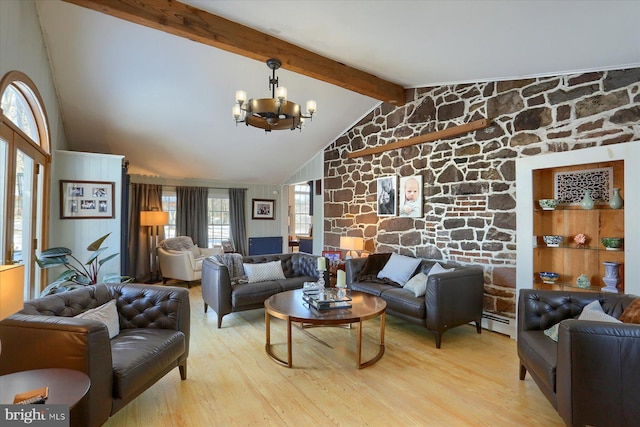 living room featuring light wood-type flooring, lofted ceiling with beams, an inviting chandelier, and a baseboard heating unit