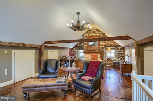 living room featuring vaulted ceiling, dark wood-type flooring, and an inviting chandelier