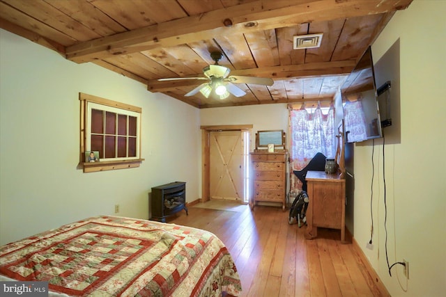 bedroom with light hardwood / wood-style floors, ceiling fan, beam ceiling, and wooden ceiling