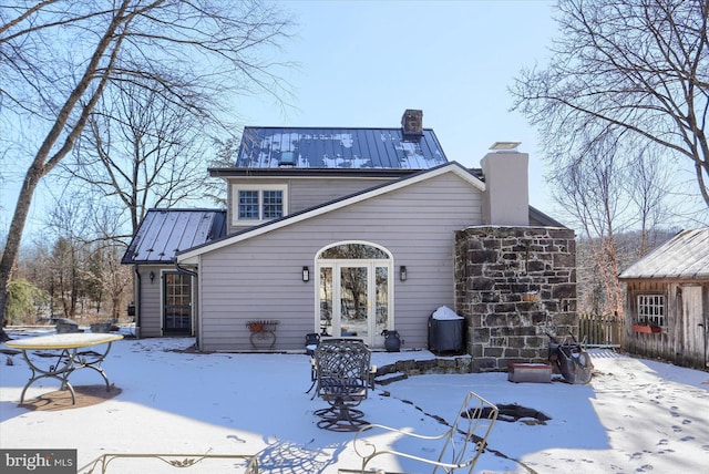 view of snow covered property