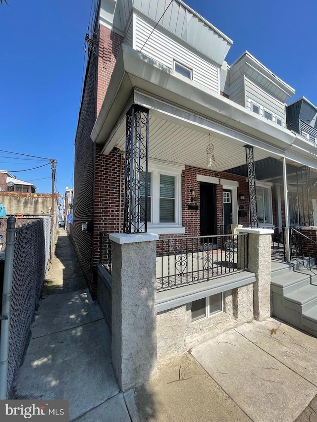 view of front of home featuring covered porch