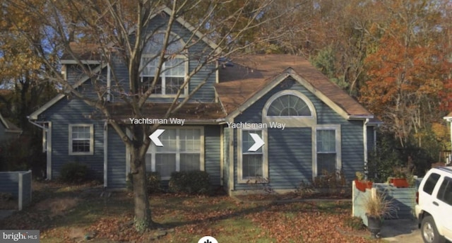 view of front of property featuring cooling unit