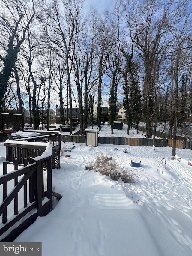 view of yard covered in snow