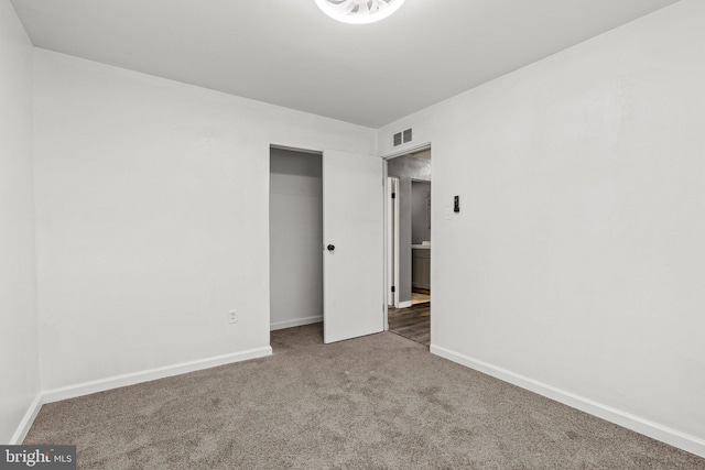 unfurnished room featuring carpet floors