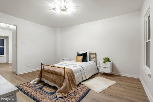 bedroom featuring light hardwood / wood-style flooring