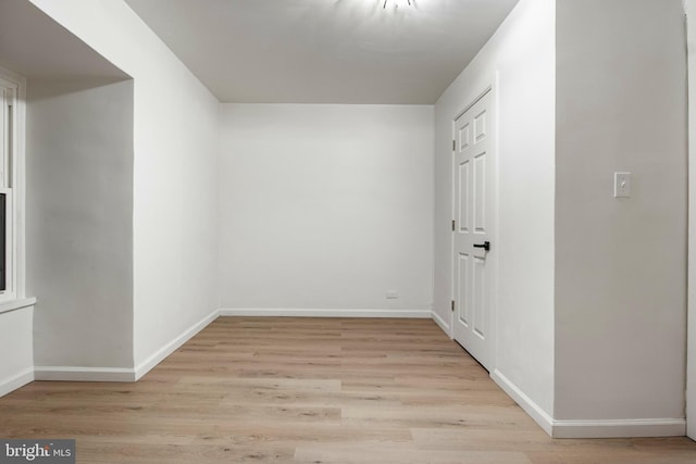 spare room featuring light hardwood / wood-style flooring