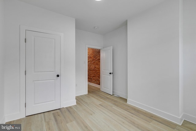 unfurnished bedroom featuring light hardwood / wood-style floors