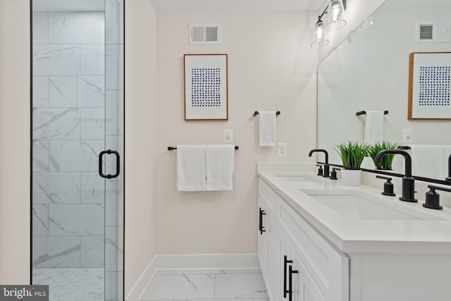 bathroom featuring vanity and a shower with door