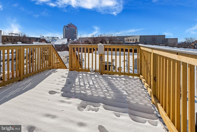 view of snow covered deck