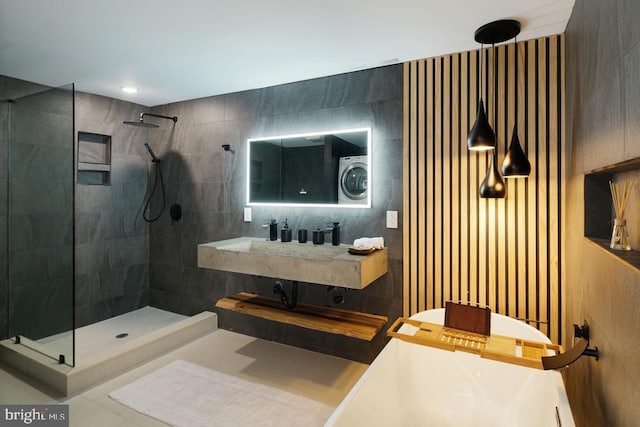 bathroom featuring tiled shower and tile walls