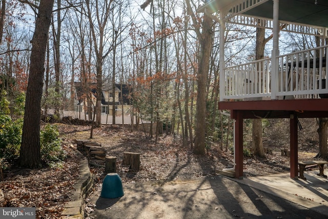 view of yard with a deck