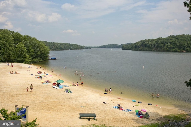 view of water feature with a beach view