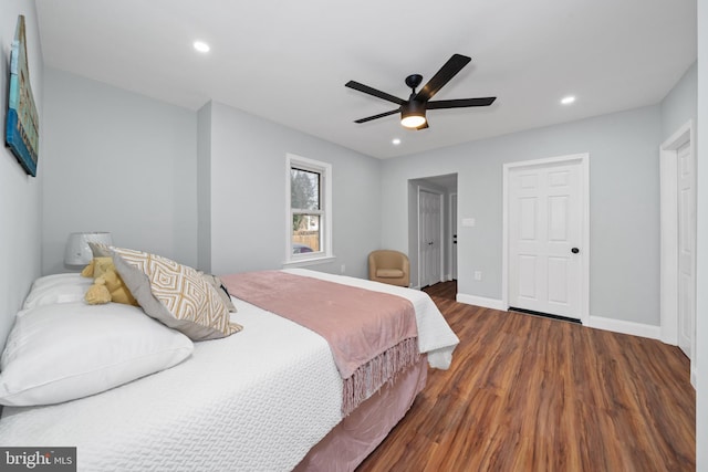 bedroom featuring ceiling fan and wood-type flooring