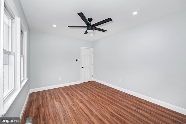 unfurnished room featuring hardwood / wood-style flooring and ceiling fan