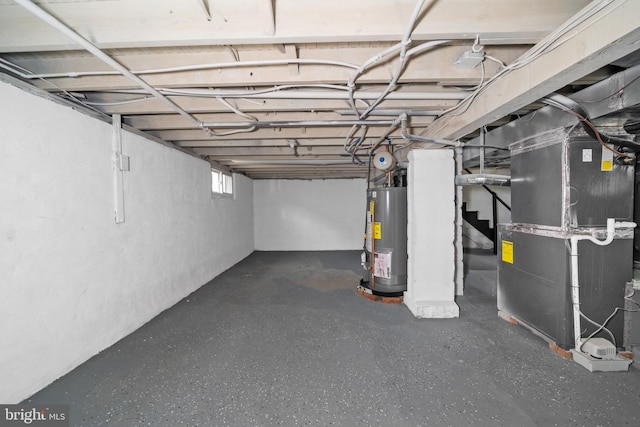 basement with heating unit and water heater