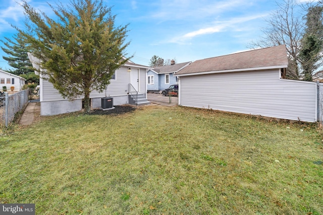 view of yard featuring central AC