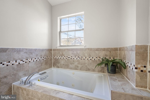 bathroom featuring tiled bath