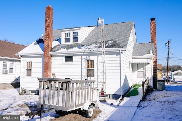 view of snow covered property