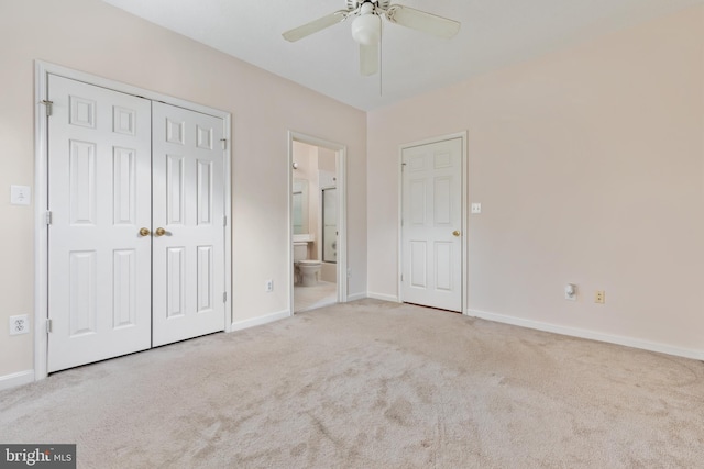 unfurnished bedroom featuring connected bathroom, ceiling fan, and light colored carpet