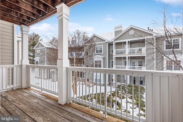 view of snow covered deck