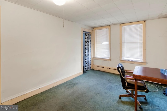 unfurnished office with carpet flooring and baseboard heating