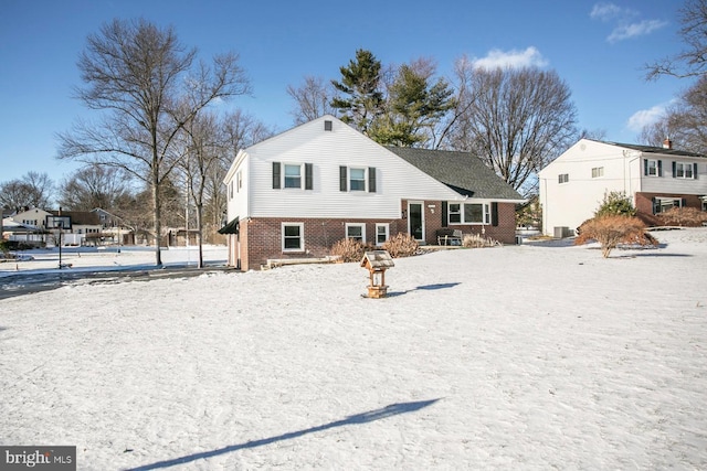 view of snow covered property