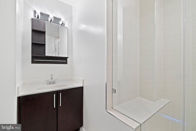 bathroom featuring vanity and walk in shower