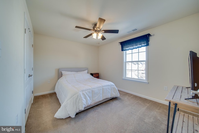 carpeted bedroom with ceiling fan