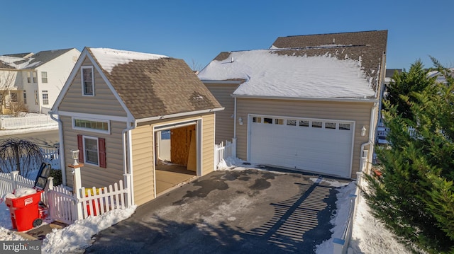 view of front of home with a garage