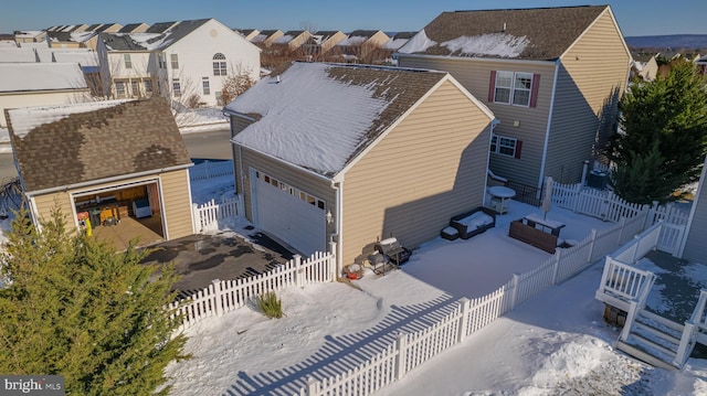 birds eye view of property with a residential view