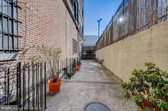 view of side of home featuring a patio