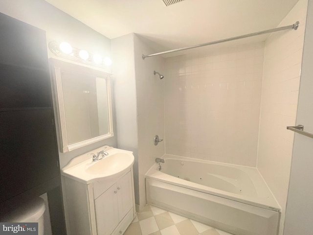 bathroom with vanity and bathing tub / shower combination