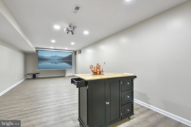 home theater featuring wood-type flooring