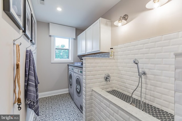 washroom featuring washer and dryer