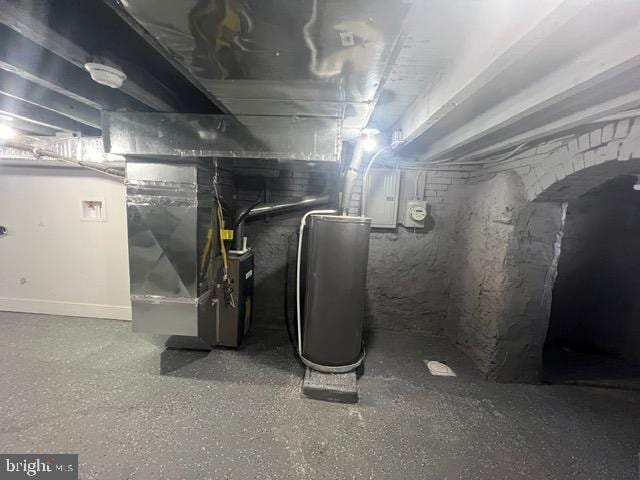 utility room with heating unit