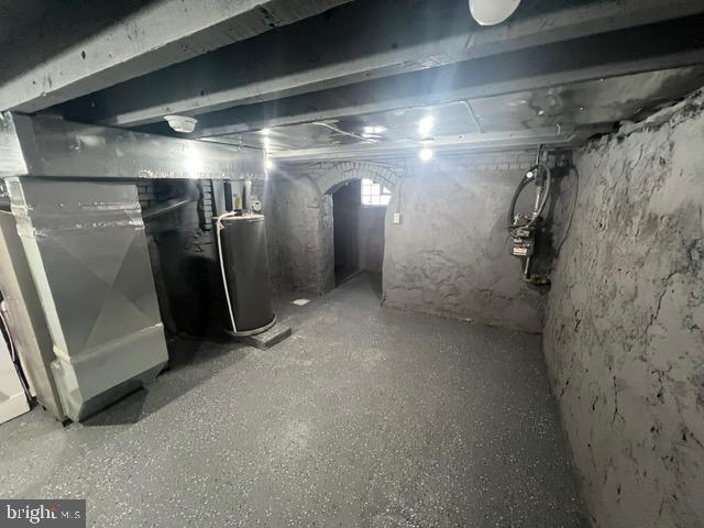 basement featuring water heater