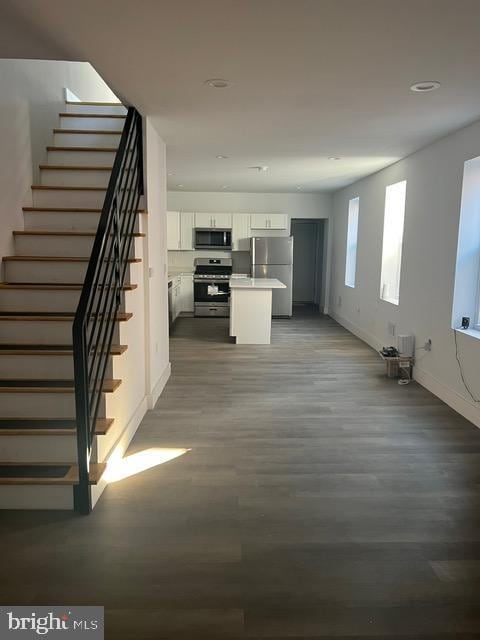 interior space featuring dark hardwood / wood-style flooring