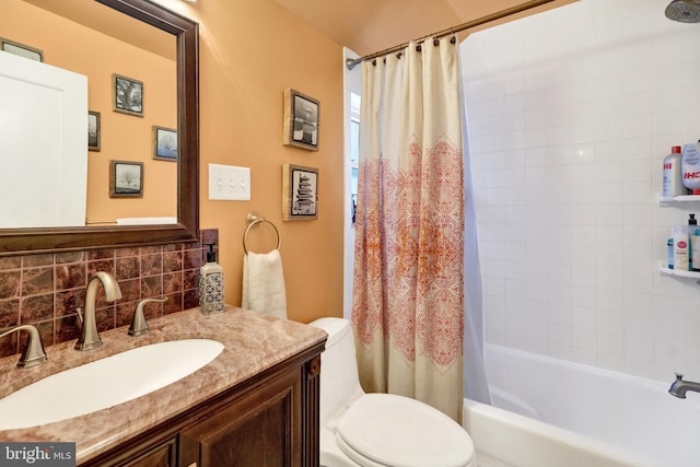 full bathroom with tasteful backsplash, vanity, shower / bath combination with curtain, and toilet