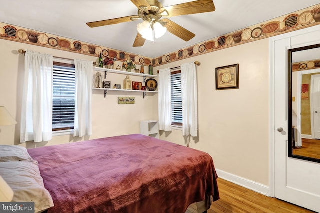 bedroom featuring ceiling fan and light hardwood / wood-style floors