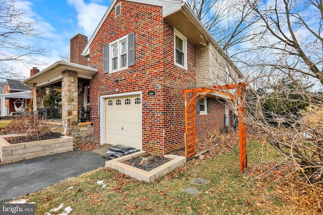 view of home's exterior featuring a garage