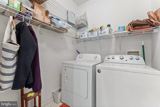 laundry area featuring washing machine and clothes dryer