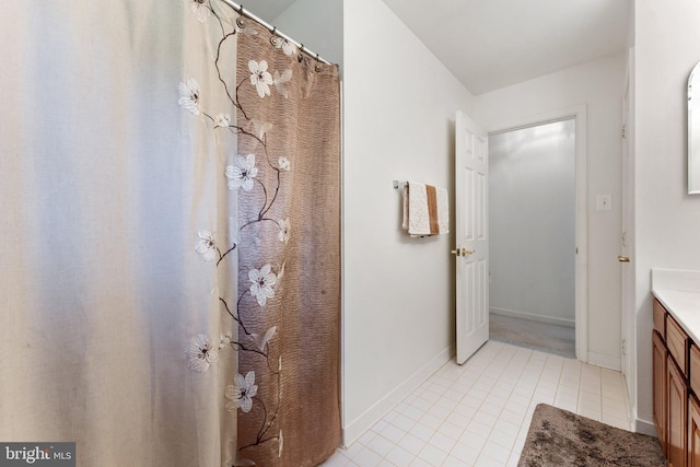 bathroom with vanity and tile patterned floors