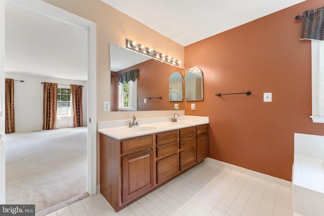 bathroom with vanity and tile patterned floors