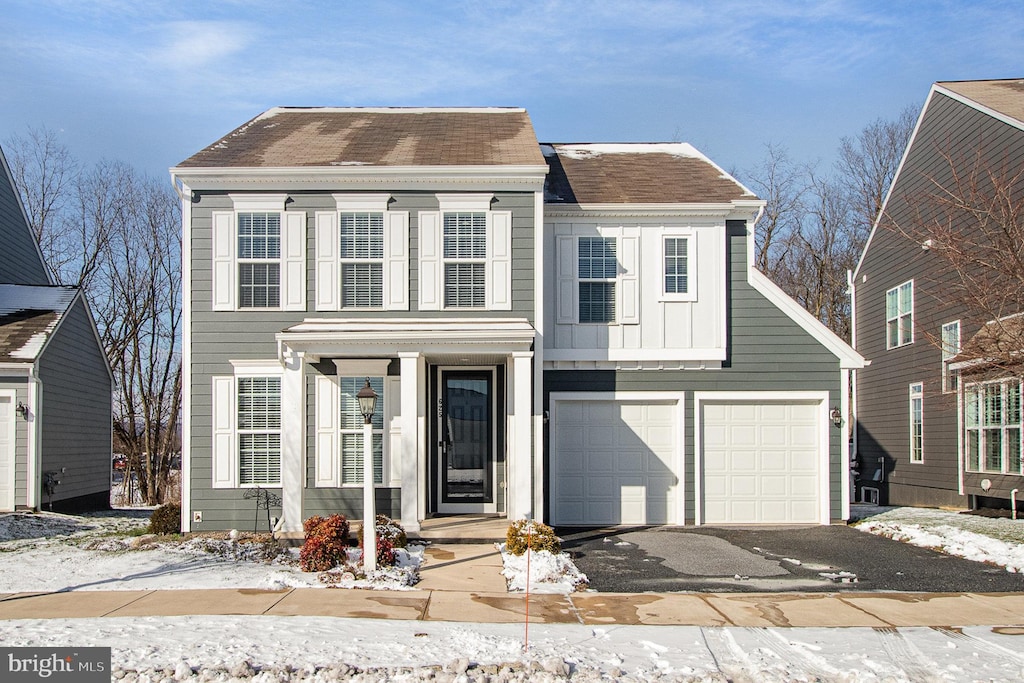 view of front of home with a garage