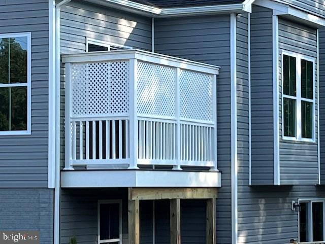 view of home's exterior with a balcony