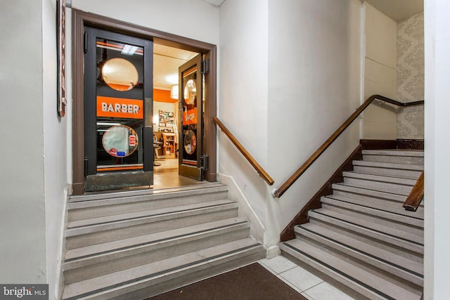 stairs with tile patterned flooring