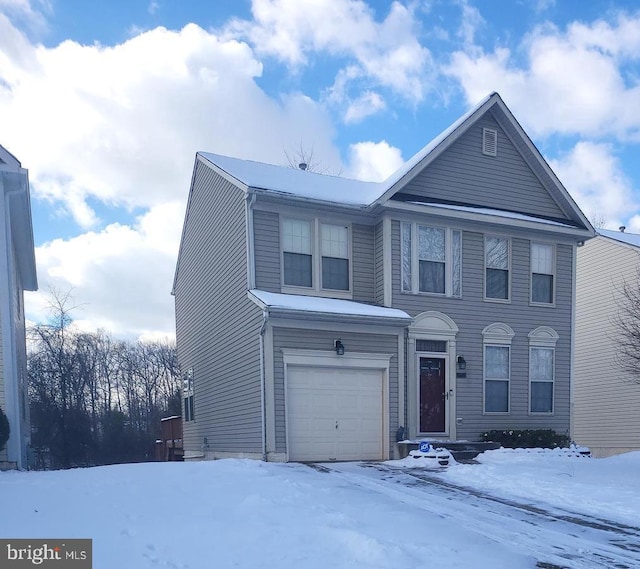 view of front of home with a garage