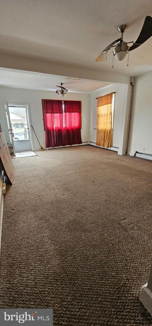 unfurnished living room with carpet floors